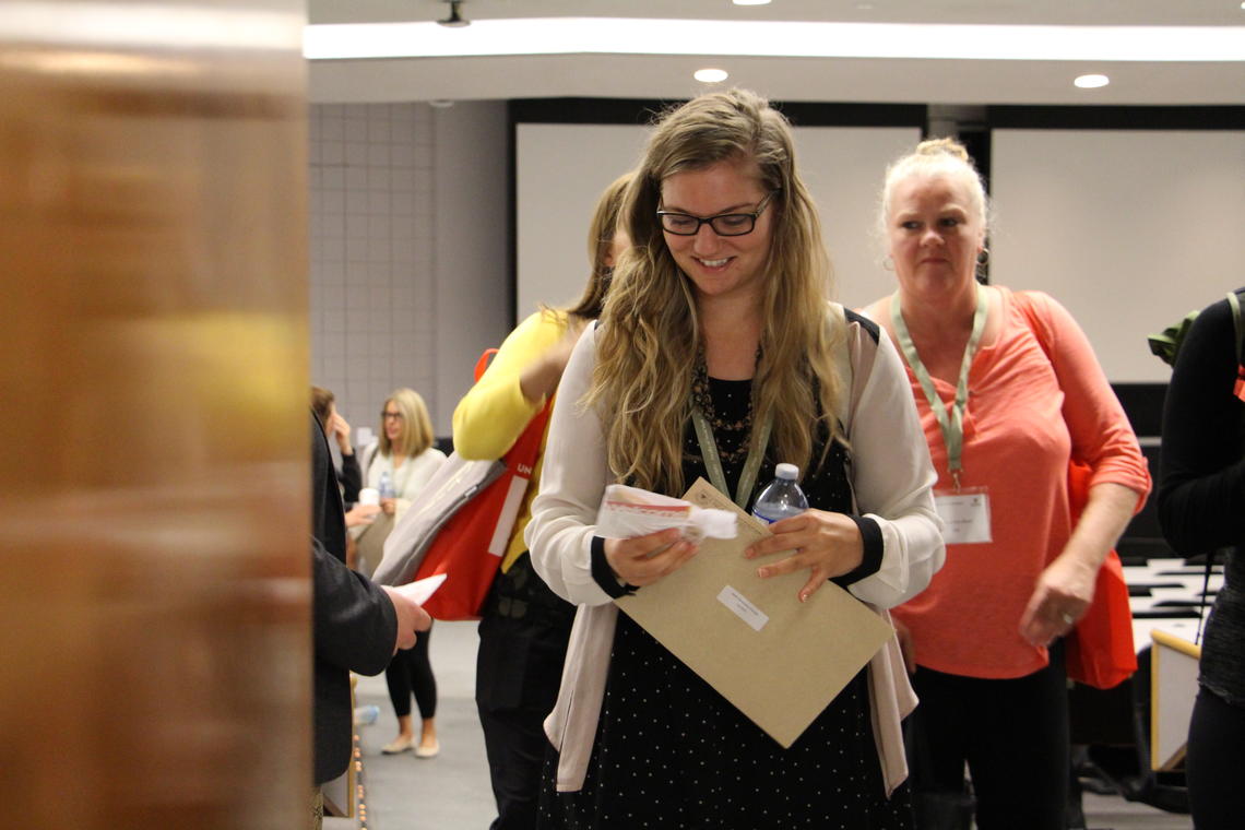 Incoming social work students line up to receive their keys at the University of Calgary student orientation.