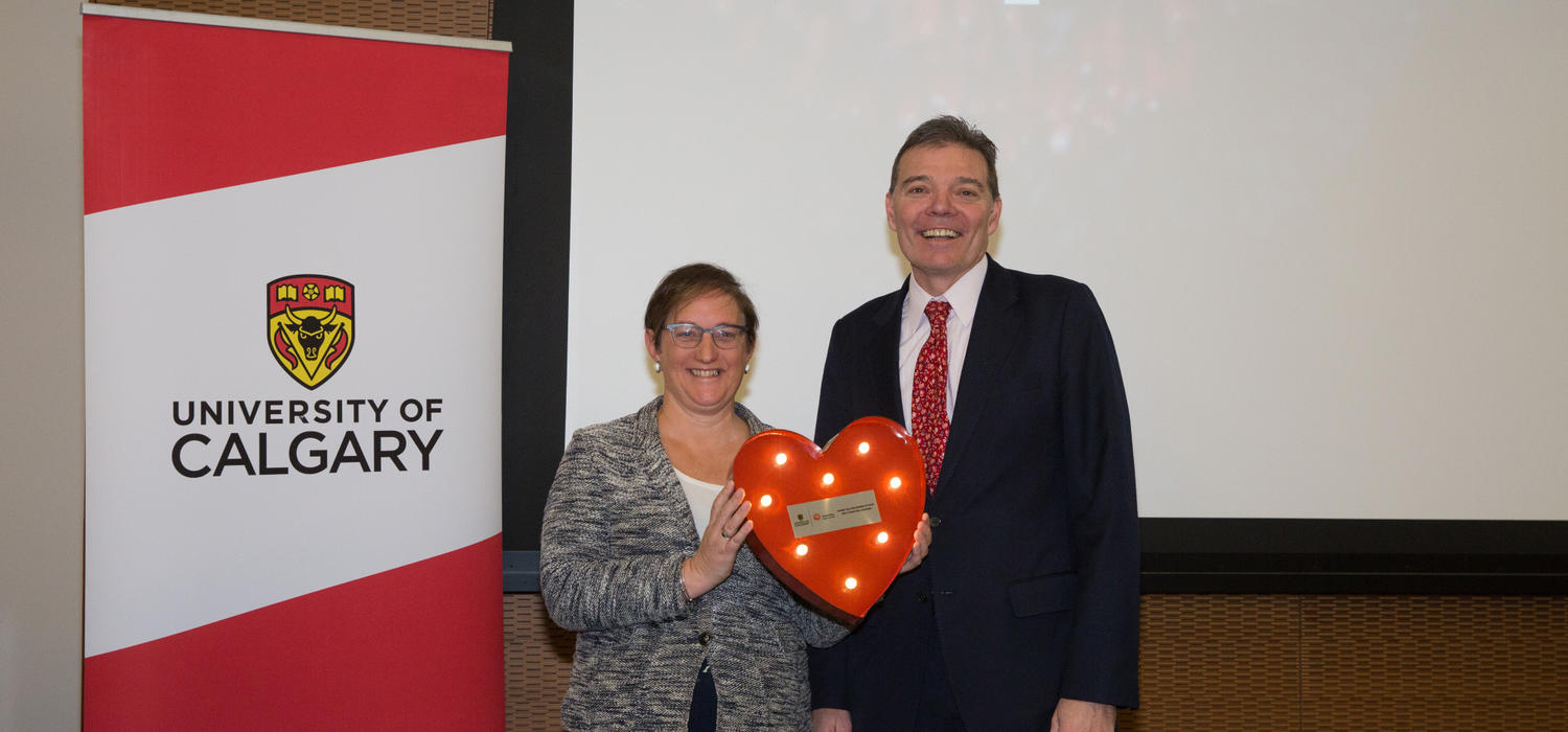 Diane Kenyon, vice-president (university relations) and United Way campaign executive sponsor and Richard Sigurdson, Faculty of Arts dean and United Way campaign co-chair celebrate the record-breaking total of funds raised this year to support the community.