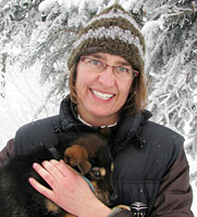 Susan Kutz Holding Puppy