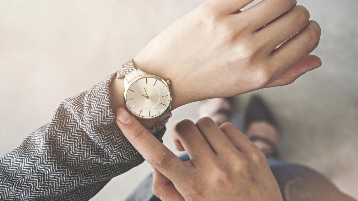 Person looking at their watch