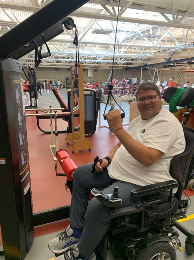 Photo of man using freemotion exercise machine