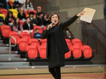 Frances Donohue, Coordinator, New Student Programs providing a speech to newly admitted student during the welcome address as part of You at UCalgary.