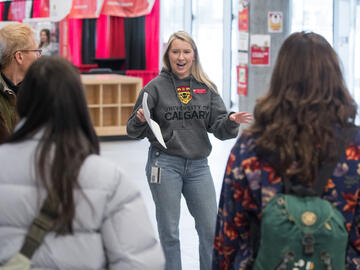 UCalgary staff member leading a campus tour