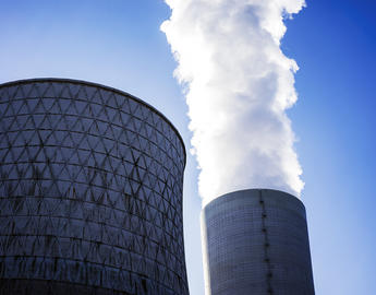 Big and toxic smoke that comes from an industrial chimney.