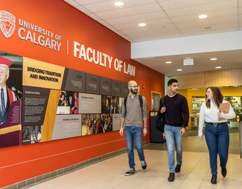 Image of students walking through the hall 