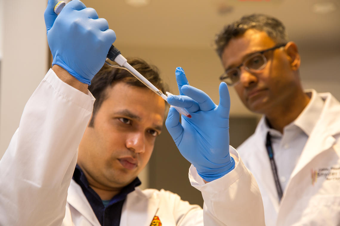 University of Calgary researchers Abu Naser Mohon, left, and Dylan Pillai developed the field test that can be performed anywhere.