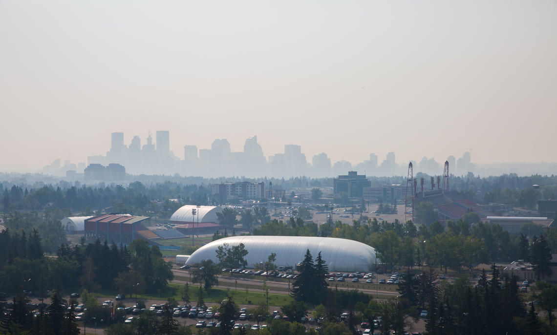 A layer of thick smoke from forest fires in British Columbia hangs over the University of Calgary campus. 