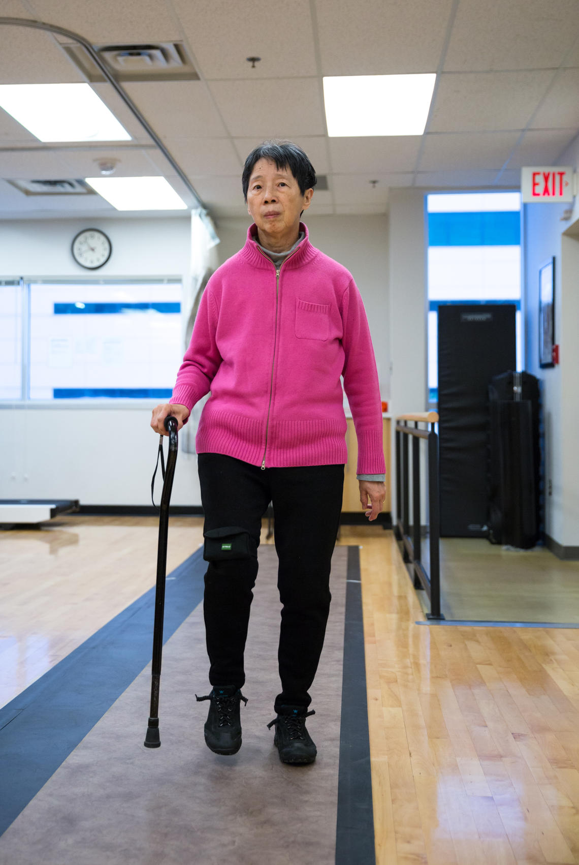 Vivien Poon, who was diagnosed with Parkinson’s disease 10 years ago, demonstrates one of the mobility tests conducted in the research study. Participants underwent a six-minute walking test using an Ambulosono wearable sensor system (seen on Vivien’s right leg). The demonstration occurred at the Clinical and Translational Exercise Physiology Laboratory, which investigates the role of exercise in the prevention and management of chronic diseases, including neurodegeneration conditions related to aging such 