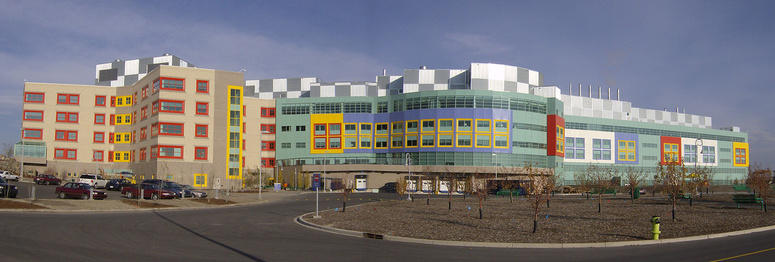 CIHR grant name: Evaluating Innovations in Transition to Adult Care: Transition Navigator Trial. Photo of Alberta Children's Hospital by Robert Thivierge, stitched by Qyd, licensed under Wikimedia Commons