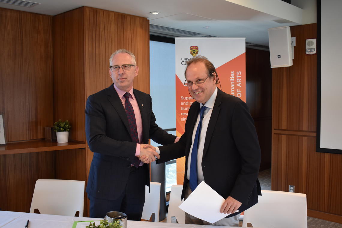 Ed McCauley, vice-president (research) at the University of Calgary, left, shakes hands with Jürgen Renn, director of the Max Planck Institute for the History of Science, on the occasion of a new research partnership between the two institutions.