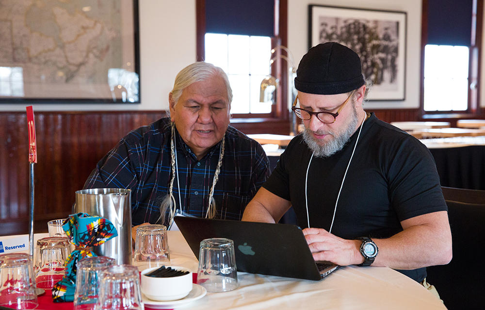 Reg Crowshoe, left, UCalgary senator and Piikuni elder, and David Lertzman, assistant professor, Haskayne School of Business, at the university's Indigenous Strategy Inner-City Dialogue Session held at Fort Calgary in 2016.