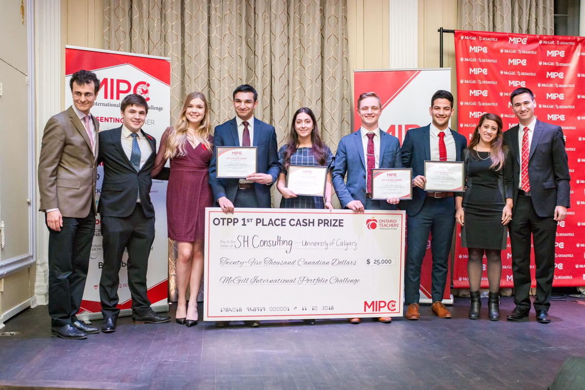 Team SH Consulting won top prize in the McGill International Portfolio Challenge. Holding certificates, from left: Alim Suleman, Daria Emami, Wyatt Phillips and Rafael Sliva. The team was coached by Tom Holloway and Rene Wells. Photo courtesy McGill International Portfolio Challenge