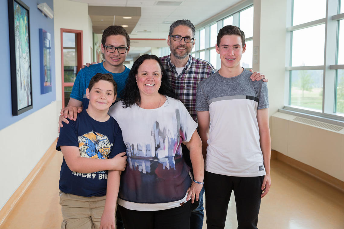 The Floer family — mom Amalia, dad Darren, and sons Joseph, Santi, and Sebastian — volunteer to participate in research studies at the University of Calgary.