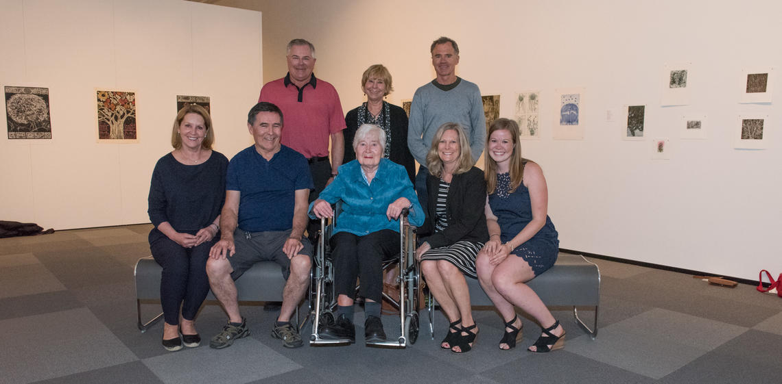 The June 2017 opening of Pressed: Four Decades of Prints by D. Helen Mackie, RCA in Nickle Galleries. Back row, from left: David Mackie, Becky Williams-Freeman, Jamie Mackie. Front row, from left: Brenda Mackie, Kerry Williams-Freeman, Dora Helen Mackie, Sandy Mackie, Leah Mackie. Photo by Dave Brown.