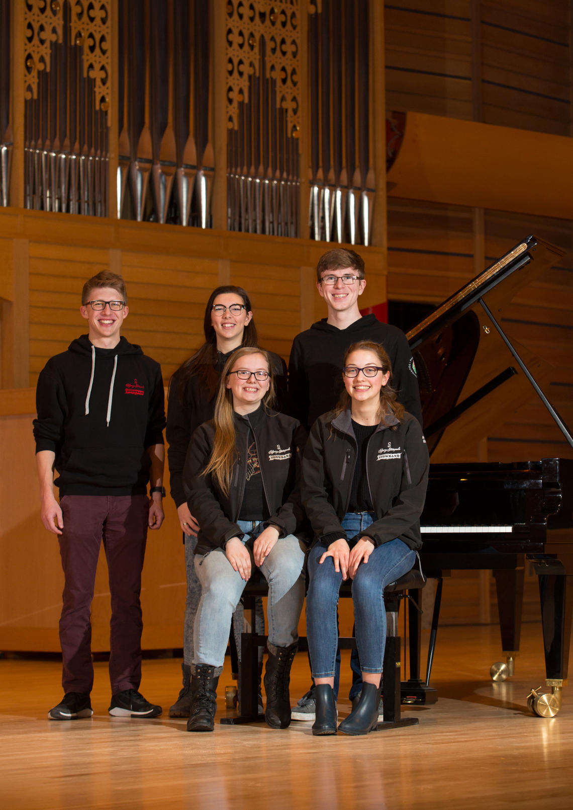 Among University of Calgary students taking part in the upcoming Alberta International Band Festival on campus are, standing, from left: Connor Beatty, Renee Thoutenhoofd, and Ethan Toblan. Seated, from left: Jessica Silbernagel and Anna Carlson.