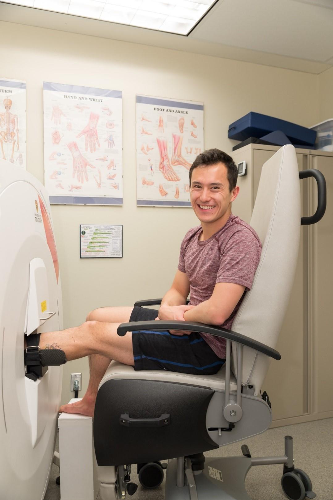 Three-time world champion and Olympic medallist figure skater Patrick Chan in the XtremeCT scanner as part of a study in the Centre for Mobility and Joint Health looking at bone health in figure skaters.  Both loading and non-loading legs are scanned to look at differences in bone microarchitecture.
