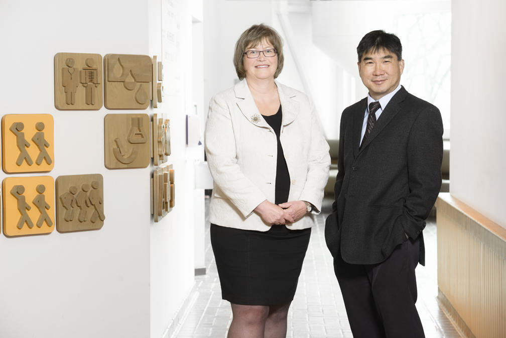 Lead author of the study, Professor Luanne Metz from the Cumming School of Medicine, with neuroscientist V. Wee Yong, who initially had the idea to test the acne medicine in an animal model.  