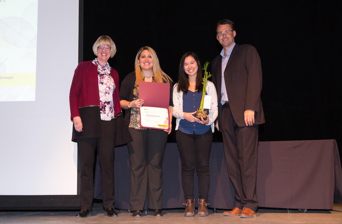 UCalgary’s Standardized Waste Bin Project won the 2019 Staff Sustainability Award: Group Leadership. Ana Pazmino, centre left, and Natasha Yee, centre right, accepted the award on the group’s behalf from Florentine Strzelczyk and Bart Becker. Photos by Riley Brandt, University of Calgary