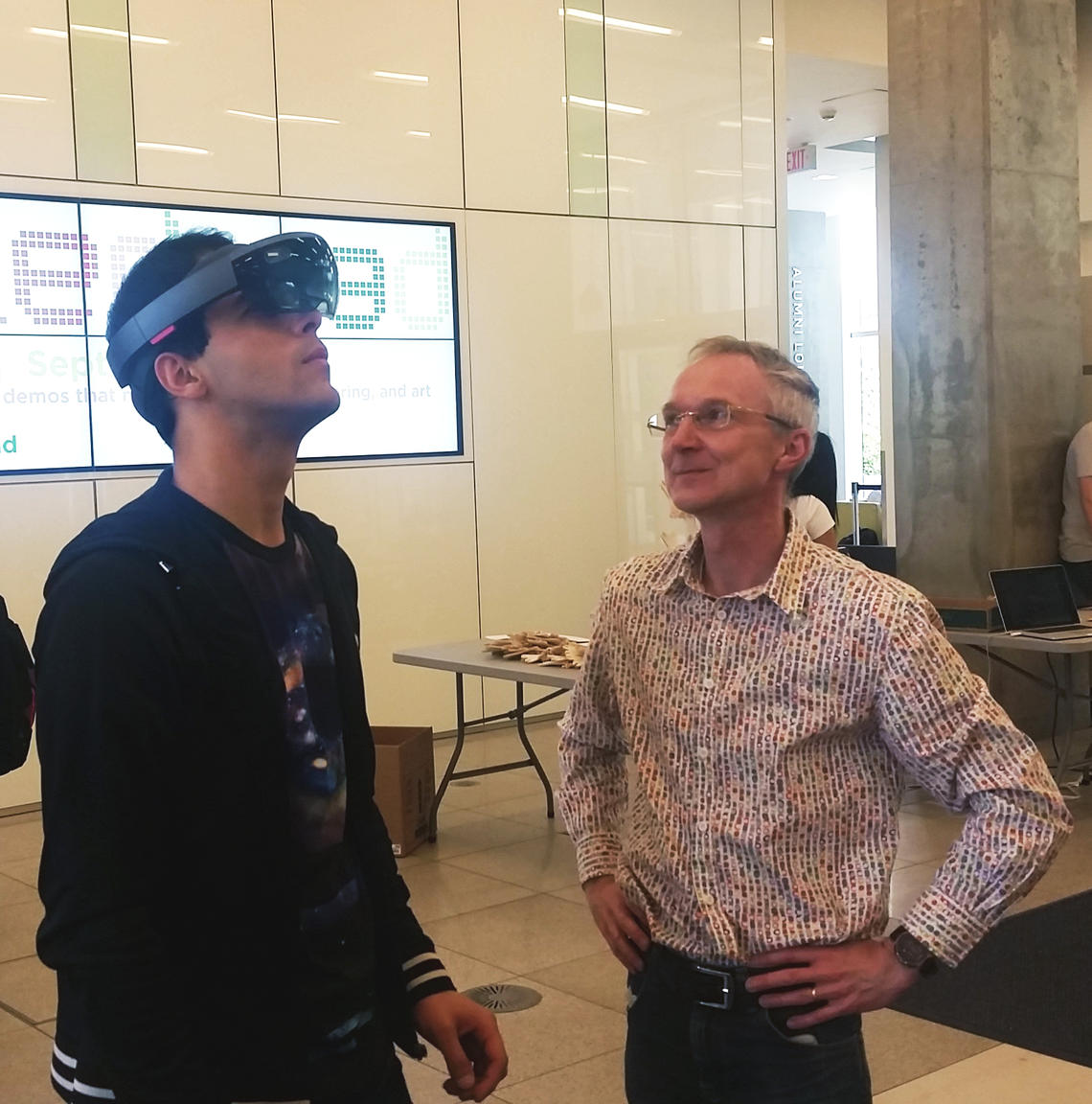 Arash Minhas, a third-year applied mathematics student, experiences the HoloLens and HoloCell during Beakerhead's Campus Collisions at the Taylor Family Digital Library on September 14.