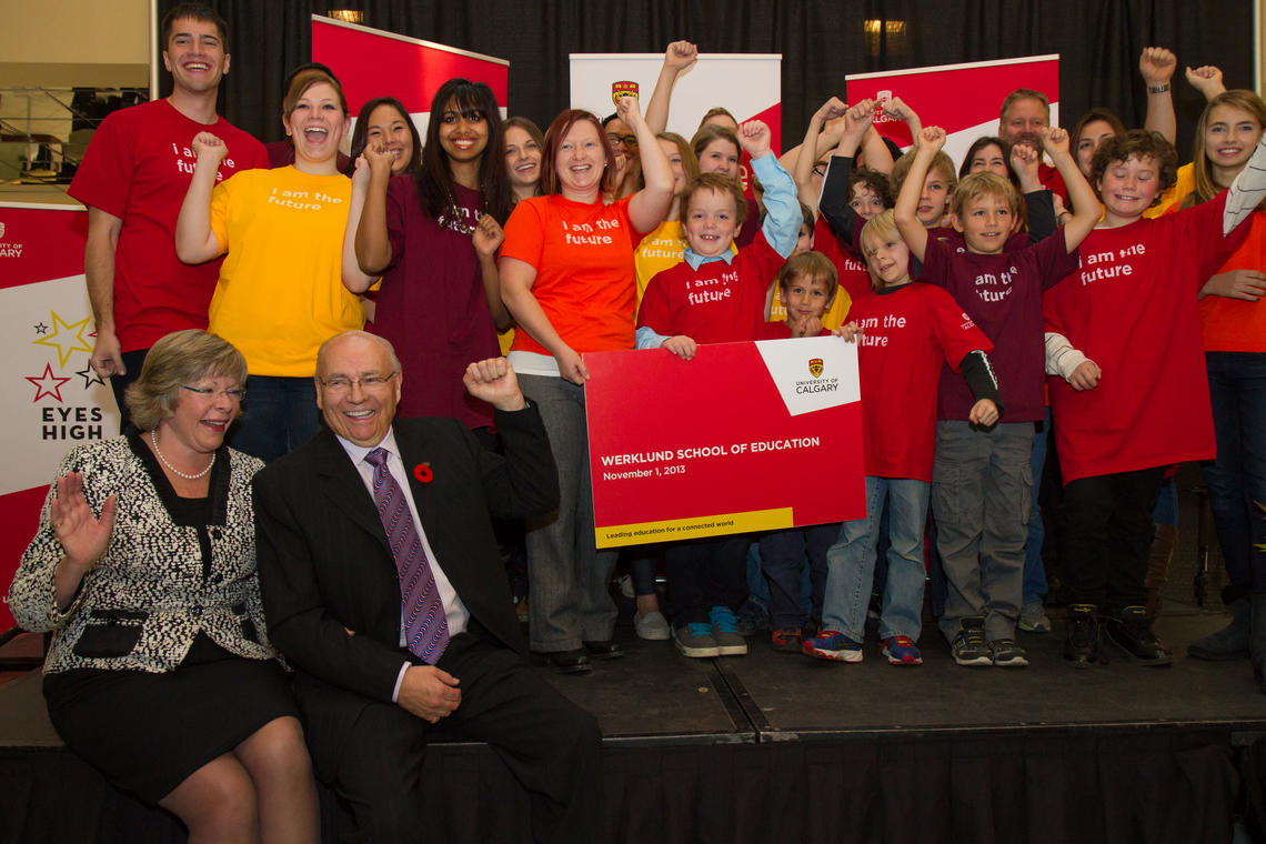 Surrounded by cheering students, Dr. David Werklund and his partner Susan Norman take part in the announcement on Friday, Nov. 1, 2013, of Werklund's $25 million donation to the newly named Werklund School of Education at the University of Calgary.