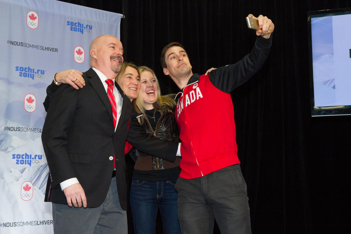 Long track speedskater Denny Morrison of Fort St. John, B.C., right, poses for a self shot with (from left) Canadian Olympic Committee board member Gene Edworthy; France St-Louis, Canadian Olympic Team assistant Chef de Mission; and Hon. Michelle Rempel, Minister of State (Western Economic Diversification).