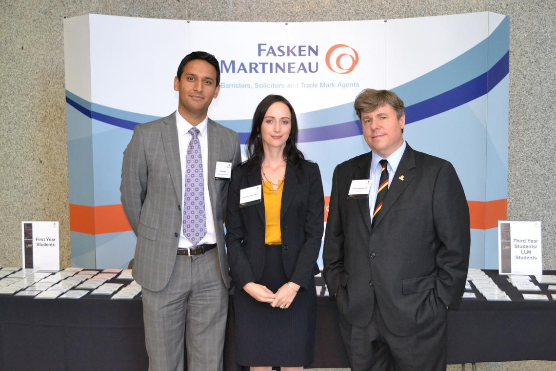 Gulu Punia of Fasken Martineau DeMoulin LLP, Breanne Hutchinson, a second-year JD student, and law dean Ian Holloway visit during the 11th annual Law Mixer.