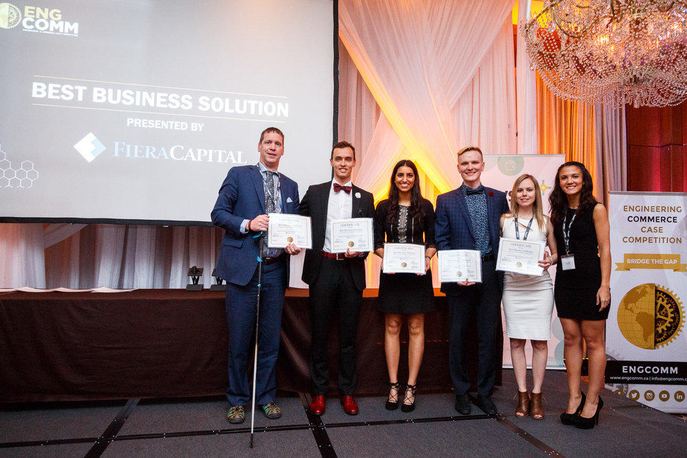 At the Engineering and Commerce Case Competition (ENGCOMM) winning first overall, best business solution and best engineering solution, from left: Cam Welsh, Haskayne senior instructor and case competition coach, NIk Golob, Manpreet Deol, Coleton Strand, Megan Leslie and Sarah Chabli, president of the ENGCOMM 2018 executive.