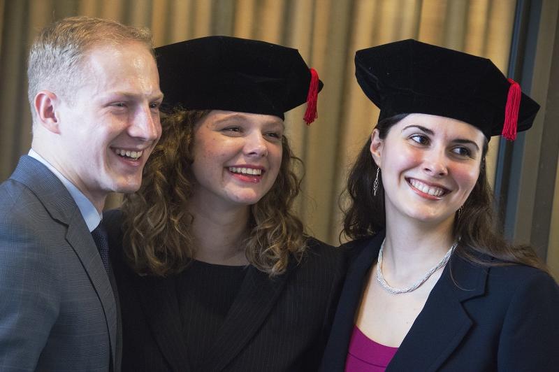 International Energy Lawyers Program graduates, from left, Barrett Schitka, Andrea James and Julia Gill.