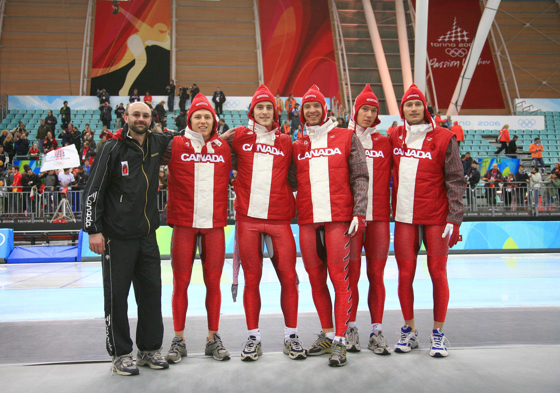 Marcel Lacroix, left, associate director of sport at the Olympic Oval, University of Calgary, with members of the national long-track speedskating team at the 2006 Olympics in Torino, Italy.