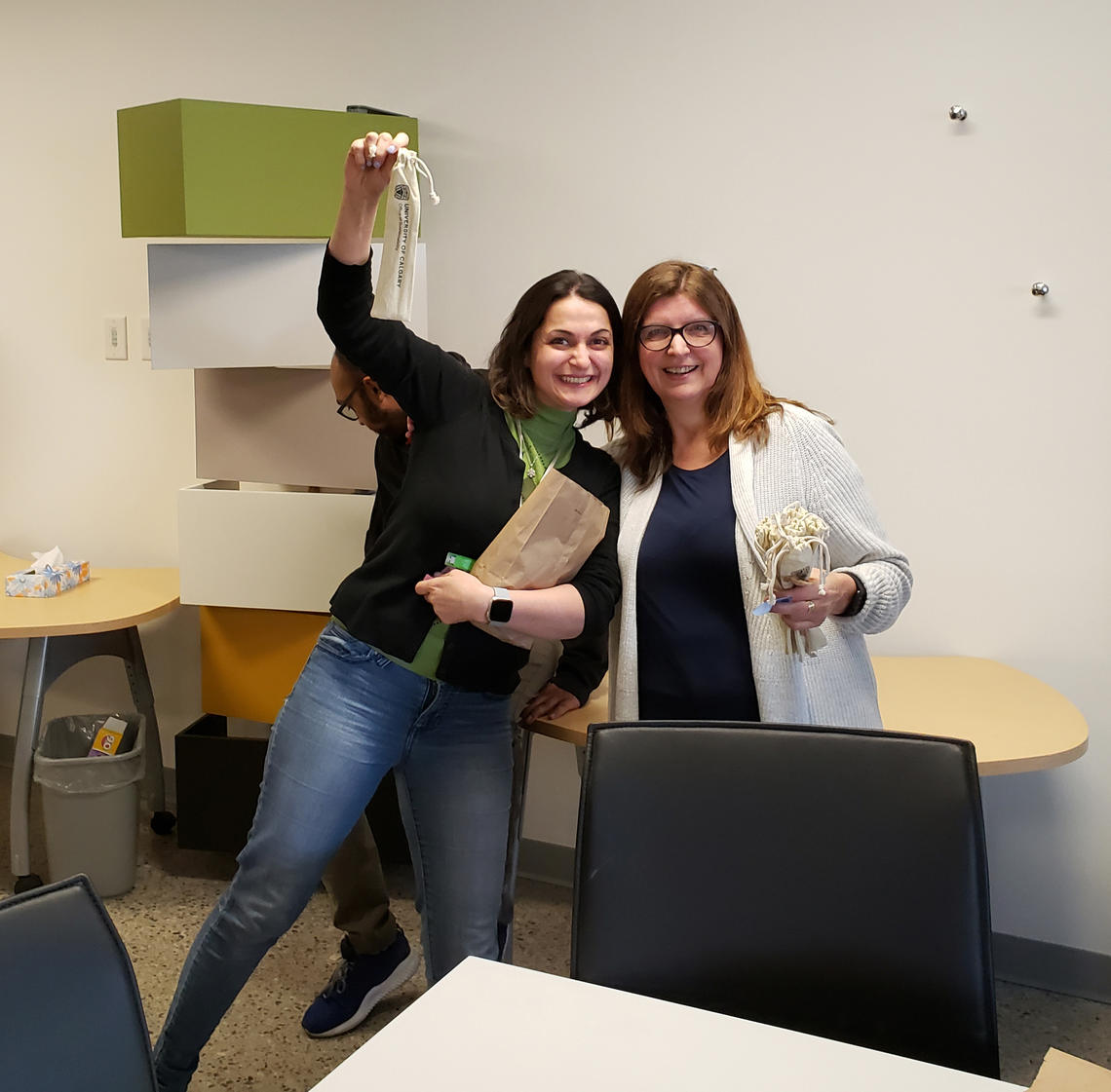 Lucky hunter Shokoufeh Manouchehr poses with sustainability co-ordinator Karen Pankraz at the Sustainable Easter egg hunt.