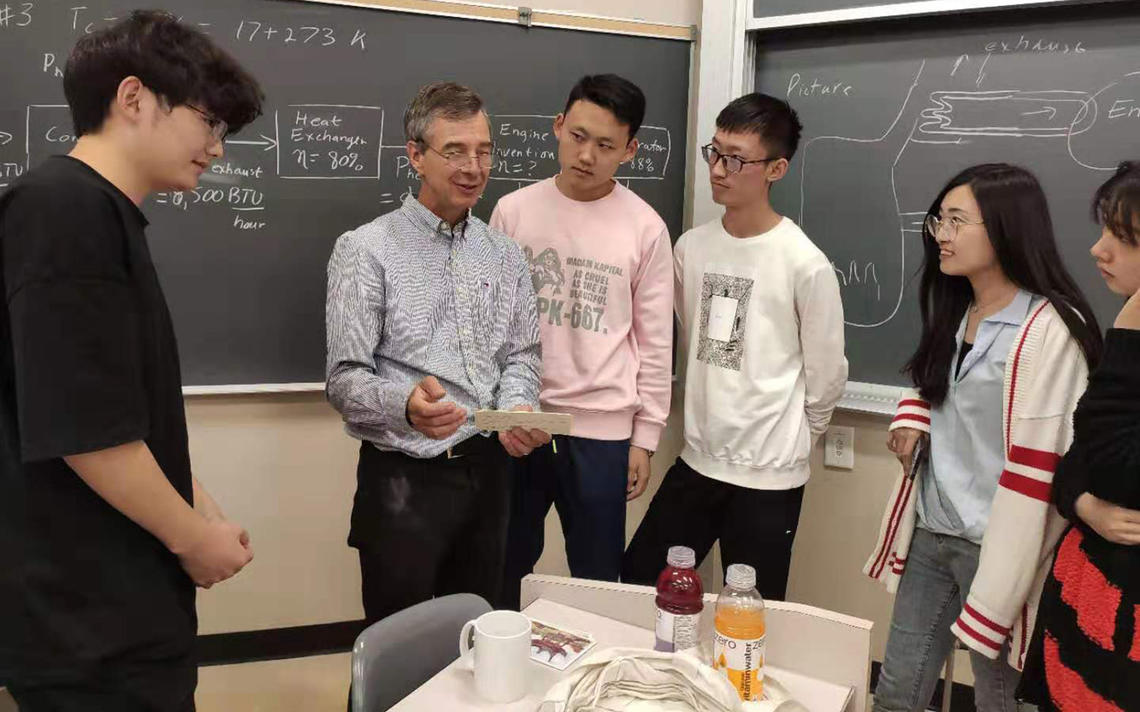 Associate Professor Ed Nowicki and CISP students in engineering classroom 