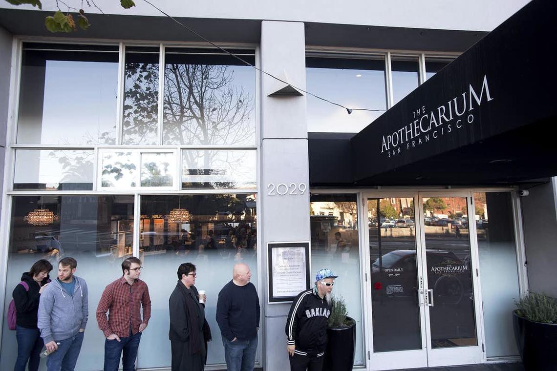 Customers wait for the opening of recreational marijuana sales at The Apothecarium on Jan. 6, 2018, in San Francisco.