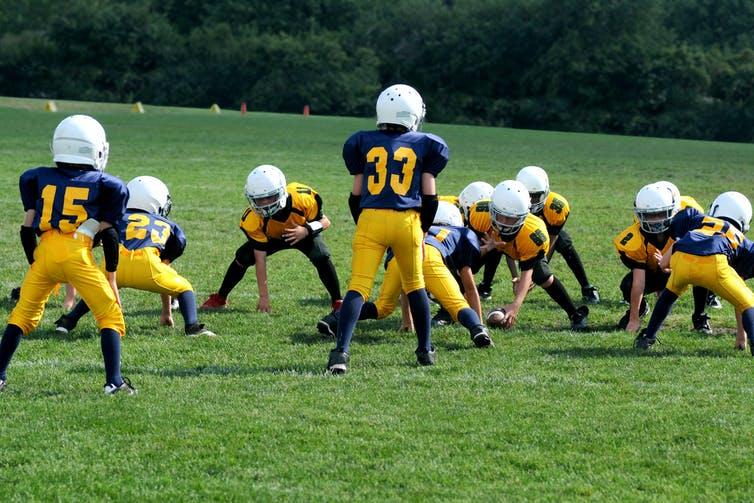 Limiting full-contact play during practices may help prevent concussion in youth football