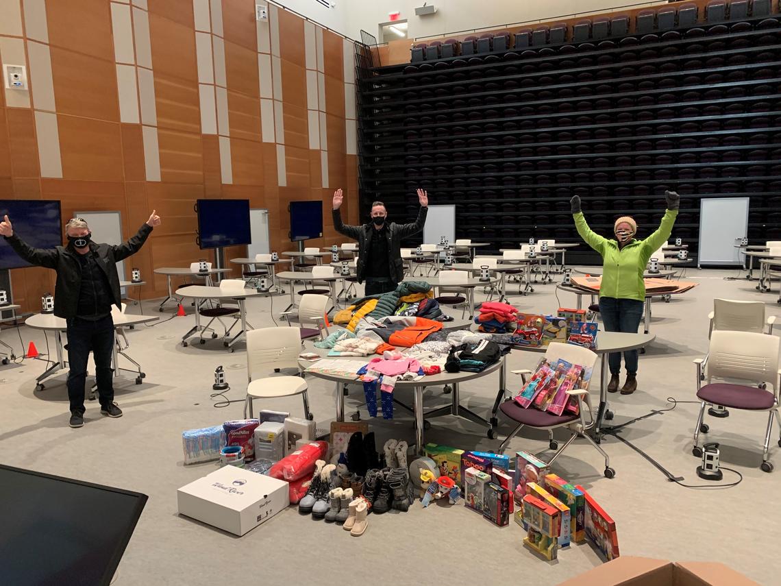 Haskayne EMBA students organize and sort the goods collected for this year’s charity challenge.