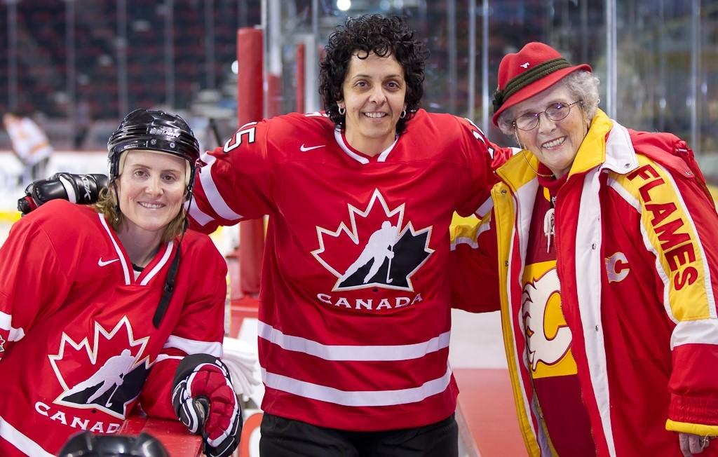 Dr. Hayley Wickenheiser, MD, (left) Danielle Goyette (centre) and Dr. Joan Snyder, Hon. LLB, at a Team Canada function at the Scotiabank Saddledome. 