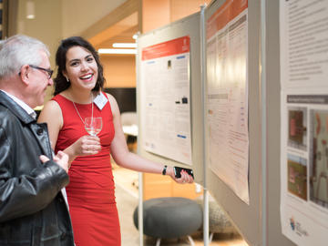 Killam Predoctoral Laureate Annamaris Olmo-Velazquez, Mechanical and Manufacturing Engineering, discusses her research with a guest