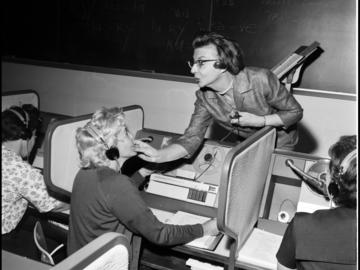 French lecturer Germaine L’Abbe helps student Beryl Woodward with pronunciation. 1964.UARC82.010.1.48