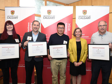 Lee Ferrari, Xu (Robin) Wang, Damian Goussis and Lisa Rowson, Facilities and University Relations. This dedicated team minimized the number of injuries during this past winter, decreasing injuries by a third.