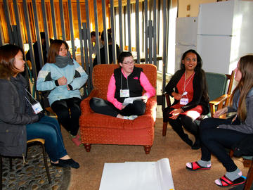 Students talk indoors during winter Camp LEAD