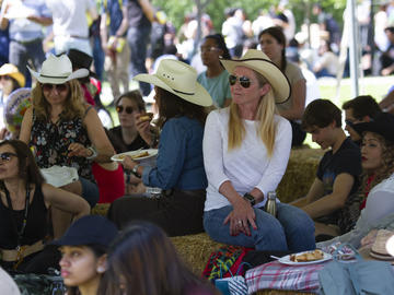 Community members enjoy a BBQ lunch on campus on July 12. 