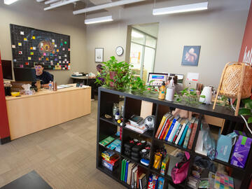Social workers and students pictured at desks at the UCalgary Recovery Community Hub