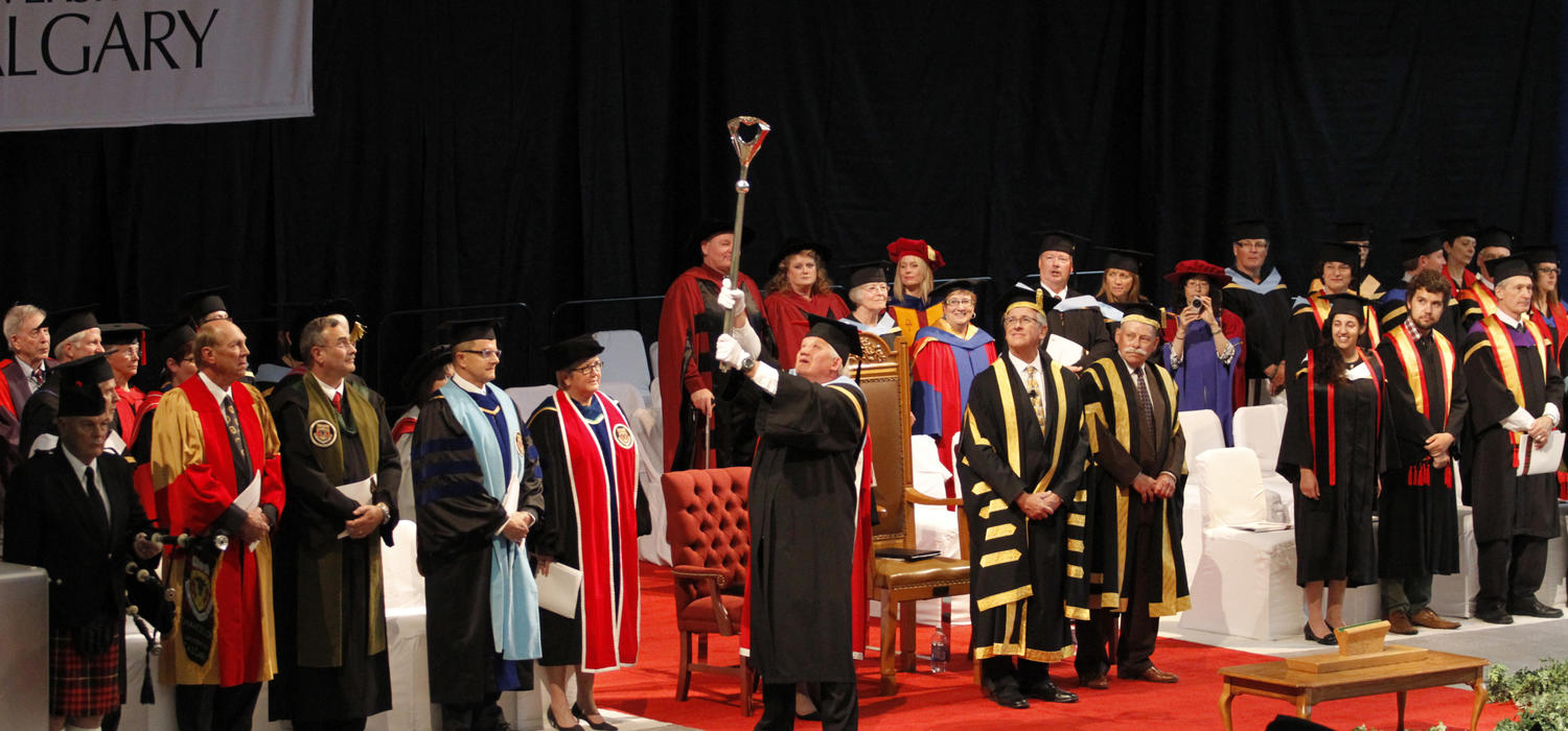 Gavin Peat brandishes the mace during convocation ceremonies at the University of Calgary.