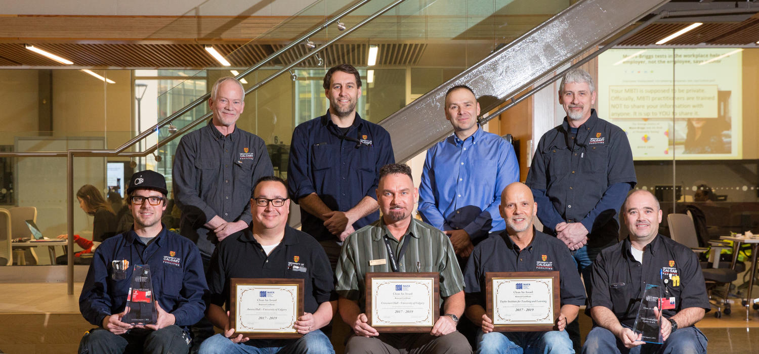 The facilities operations and maintenance team at the University of Calgary. Front row, from left: Stephen Zelmer, Ken Brewer, Robb Nesbitt, Rob Schultz, and Travis Simington. Back row, from left: Kent Fowler, Graham McPhee, Shane Hubl, and Dale Wollbaum. Photo by Riley Brandt, University of Calgary