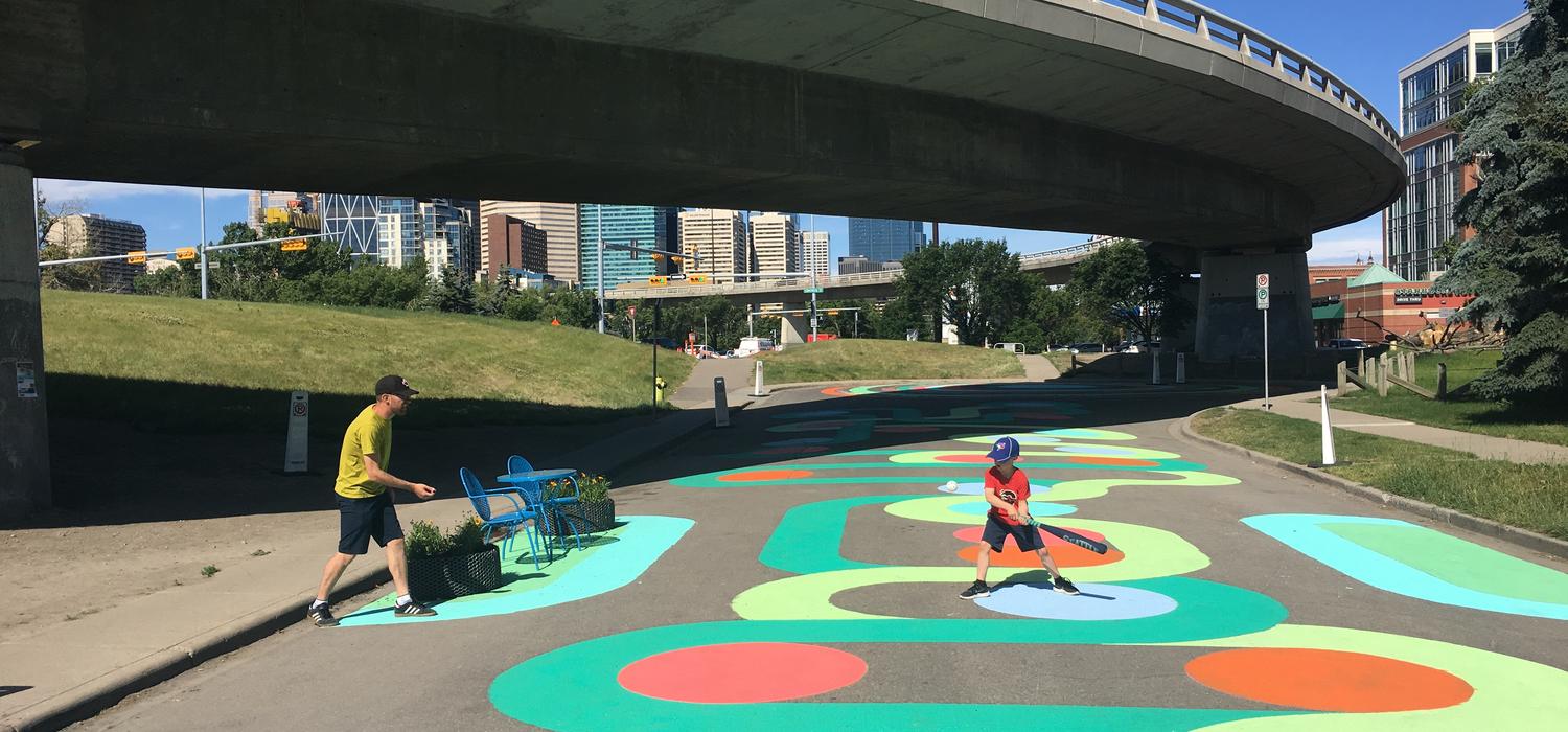 The “whimsical walk,” designed in collaboration with University of Calgary students, invites pedestrian participation through creative play opportunities.