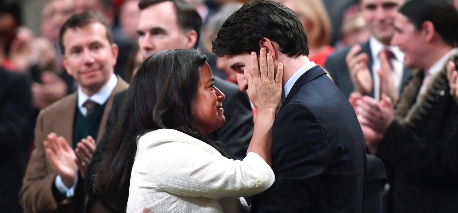 Justin Trudeau embraces woman