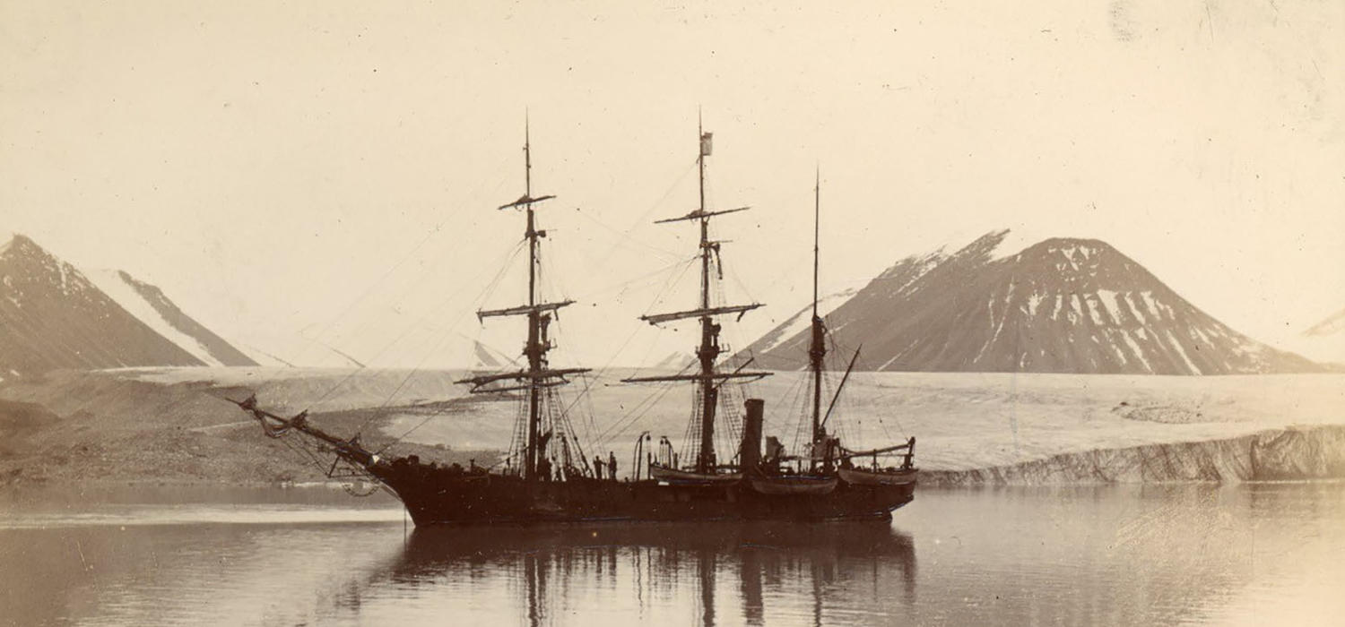 Photo of the Nova Zembla at anchor in front of a glacier, potentially Bylot Island, date unknown.