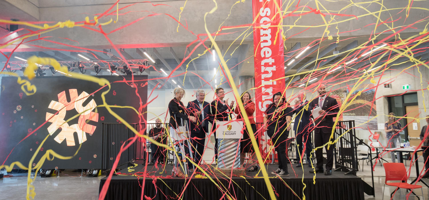 Streamers fill the air as campus leaders celebrate the launch of the Hunter Student Commons at the University of Calgary on Tuesday.