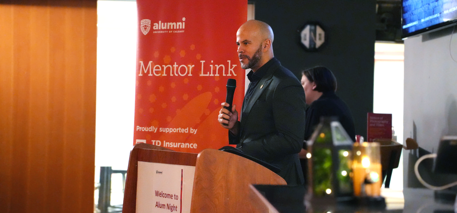 Photo of Chancellor Jon Cornish speaking at the Alum Night event at LDL on the University of Calgary campus