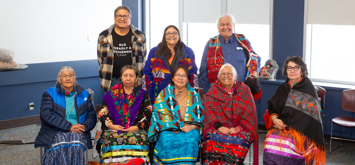 From left to right: Florence Kelly, John Chief Moon, Diane Meguinis, Monica Chief Moon, Anne Kokak, Reg Crowshoe, Rose Crowshoe and Cora Voyageur.