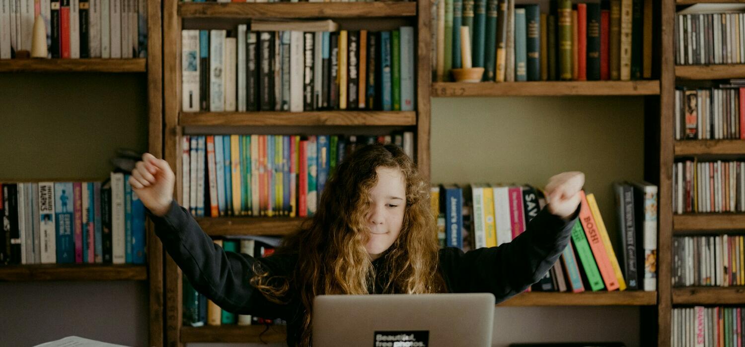 Girl sitting in front of a computer